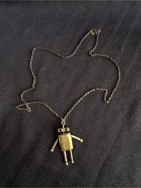 Robat gold tone long necklace cute and fun